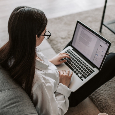 a woman learning English on her laptop